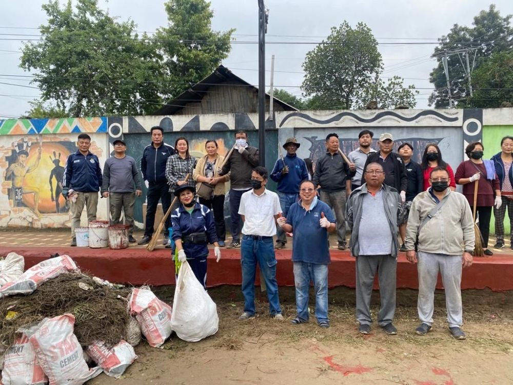 Members of Molungtok Group clean Yimkong Sidewalk, located at the PWD-Forest junction in Dimapur on December 9.